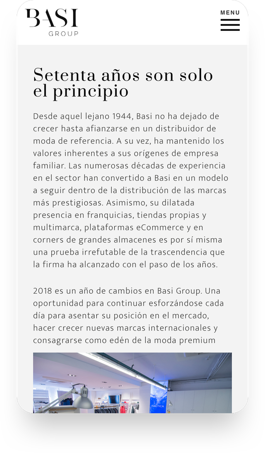 Basi Group site on mobile: a long-form editorial article set in high-contrast type.